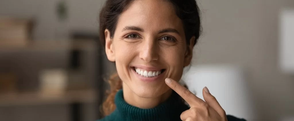 lady pointing her smile