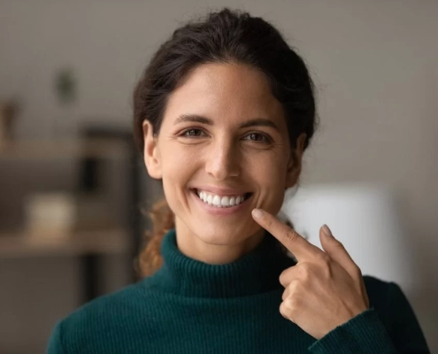 lady pointing her smile